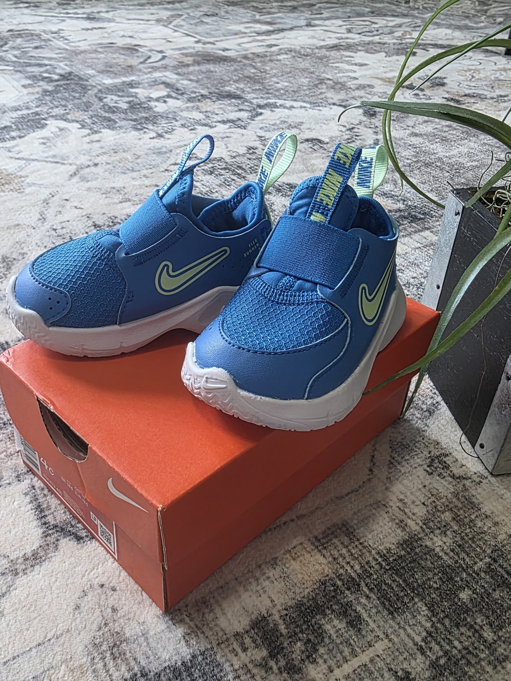 Nike Kids Blue Slip-On Sneakers with Neon Green Swoosh